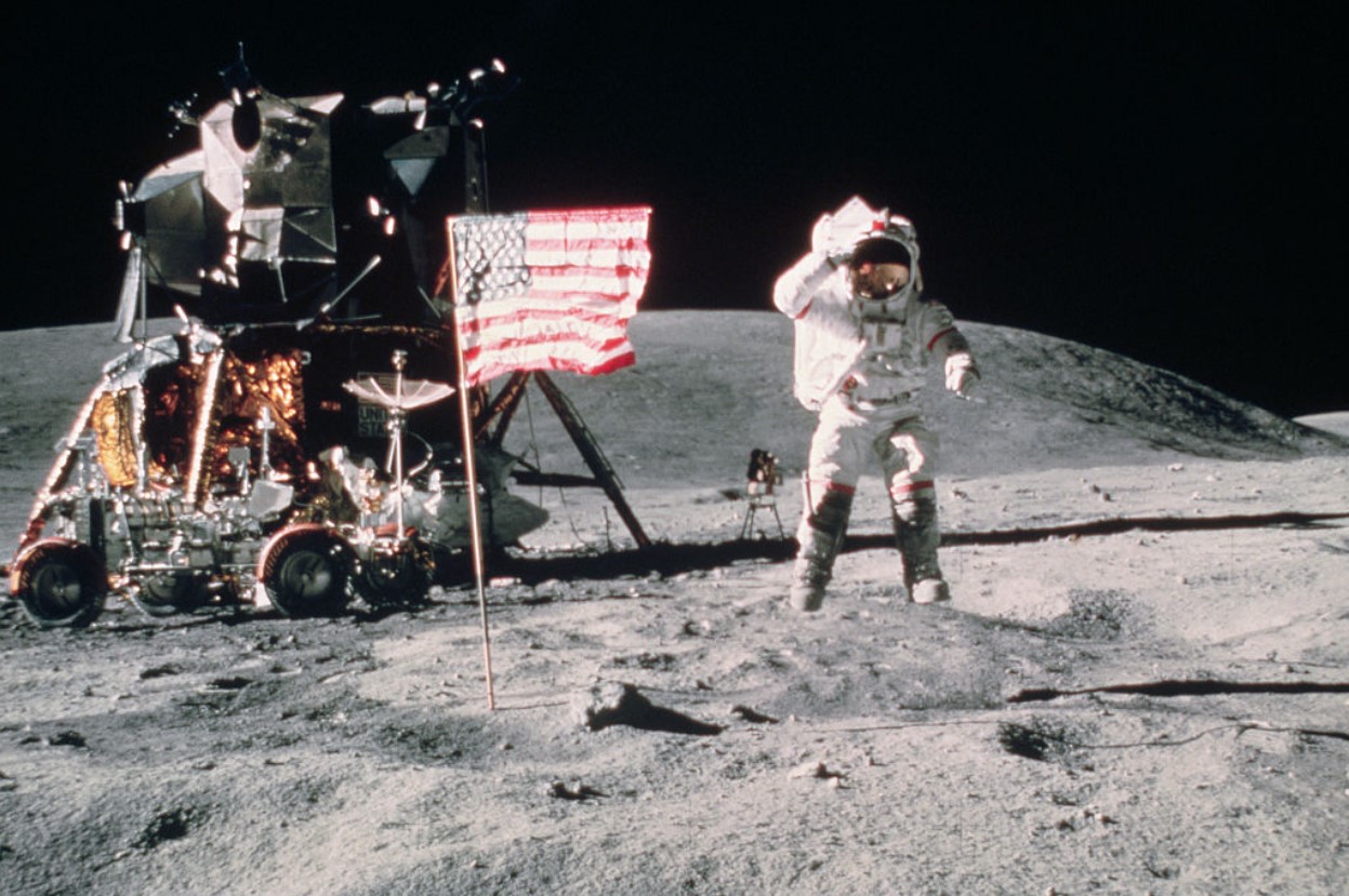 John W. Young salutes the US flag on the Moon