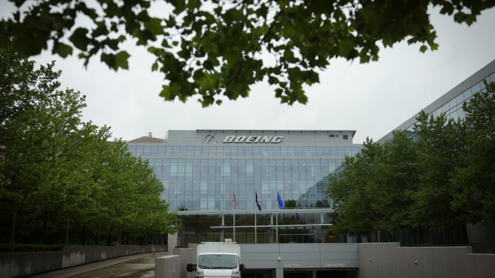 View of the Boeing building facade with large "BOEING" signage at the top