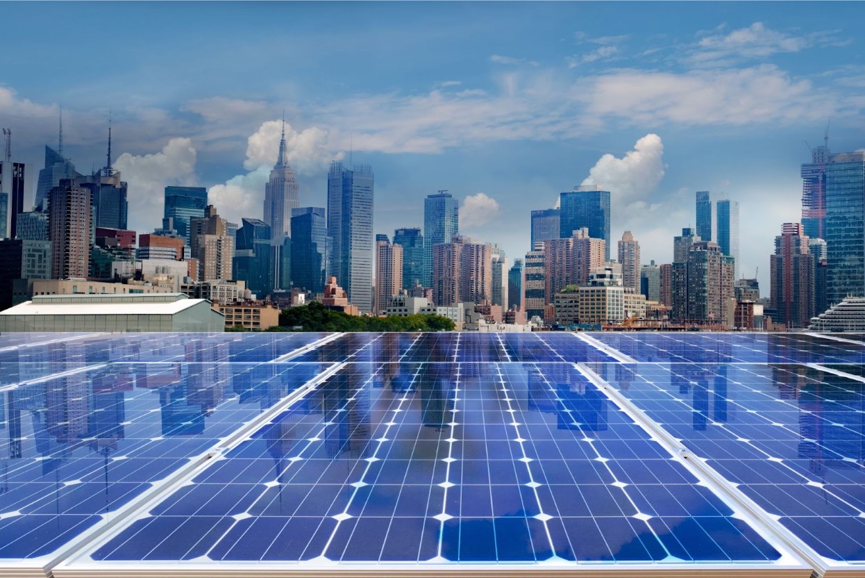 Solar panels in front of the New York City skyline