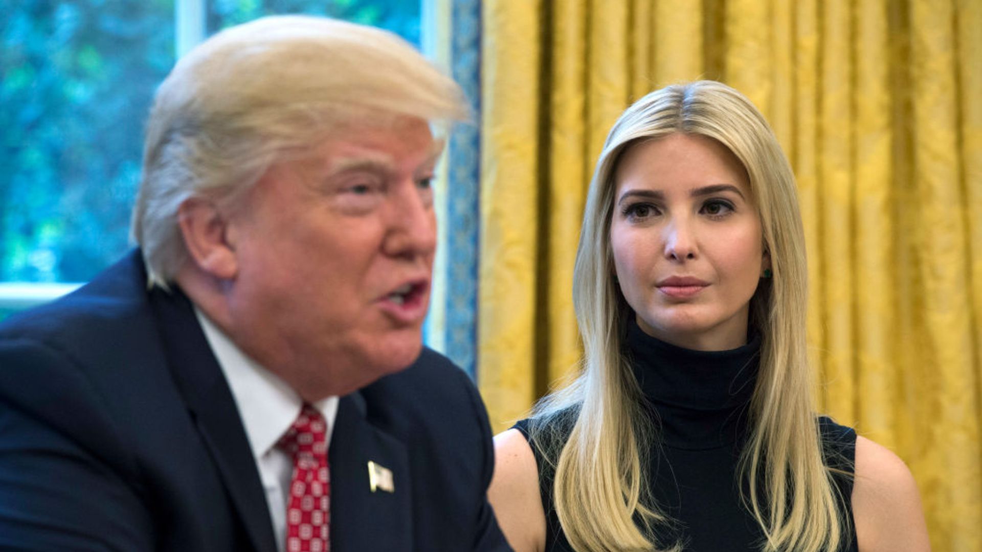 Donald Trump is captured mid-sentence with a focused expression, looking to the left. Next to him, Ivanka Trump looks ahead