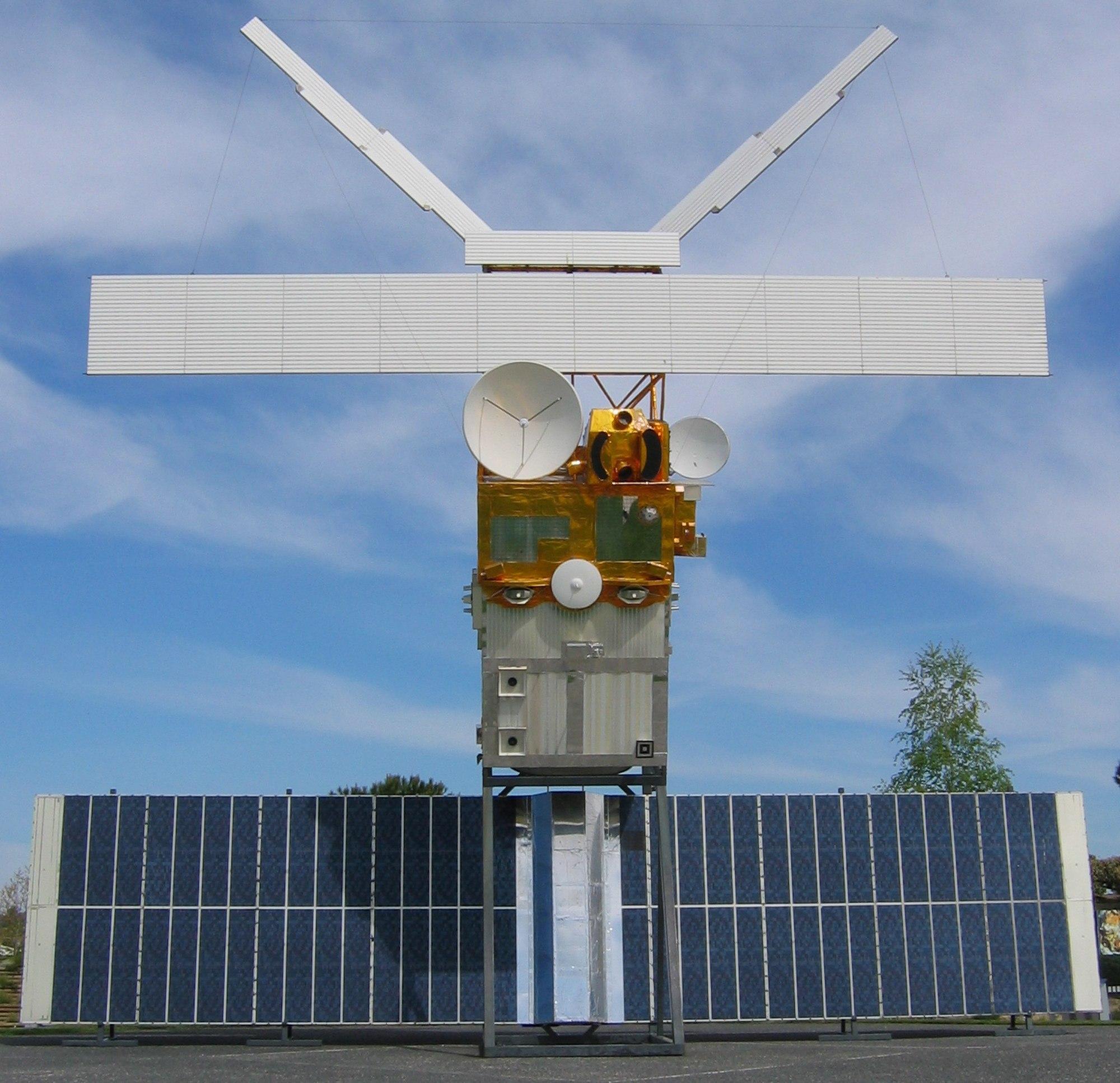 An image of a satellite mounted on the ground.