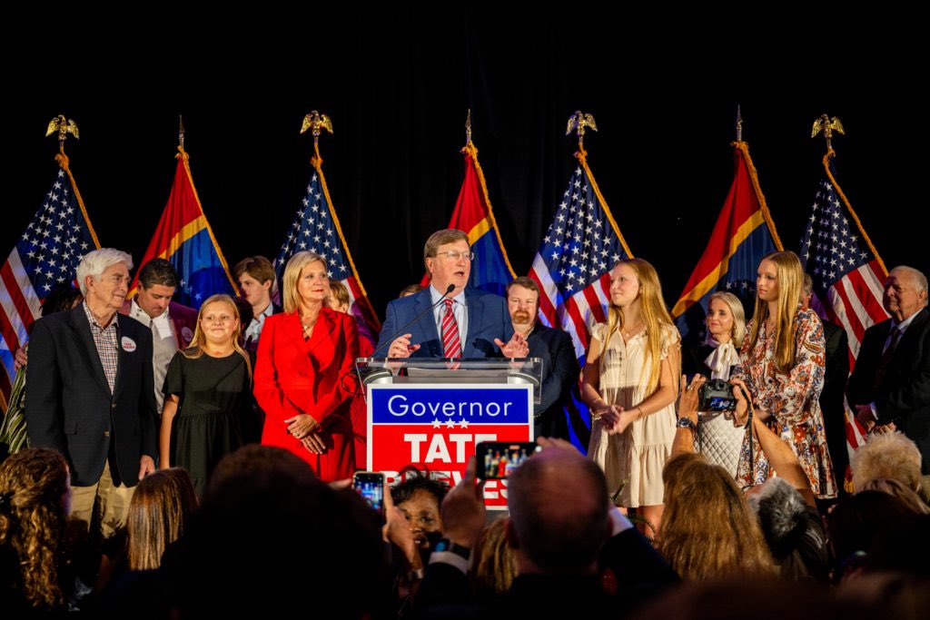 Tate Reeves on stage announcing his reelection