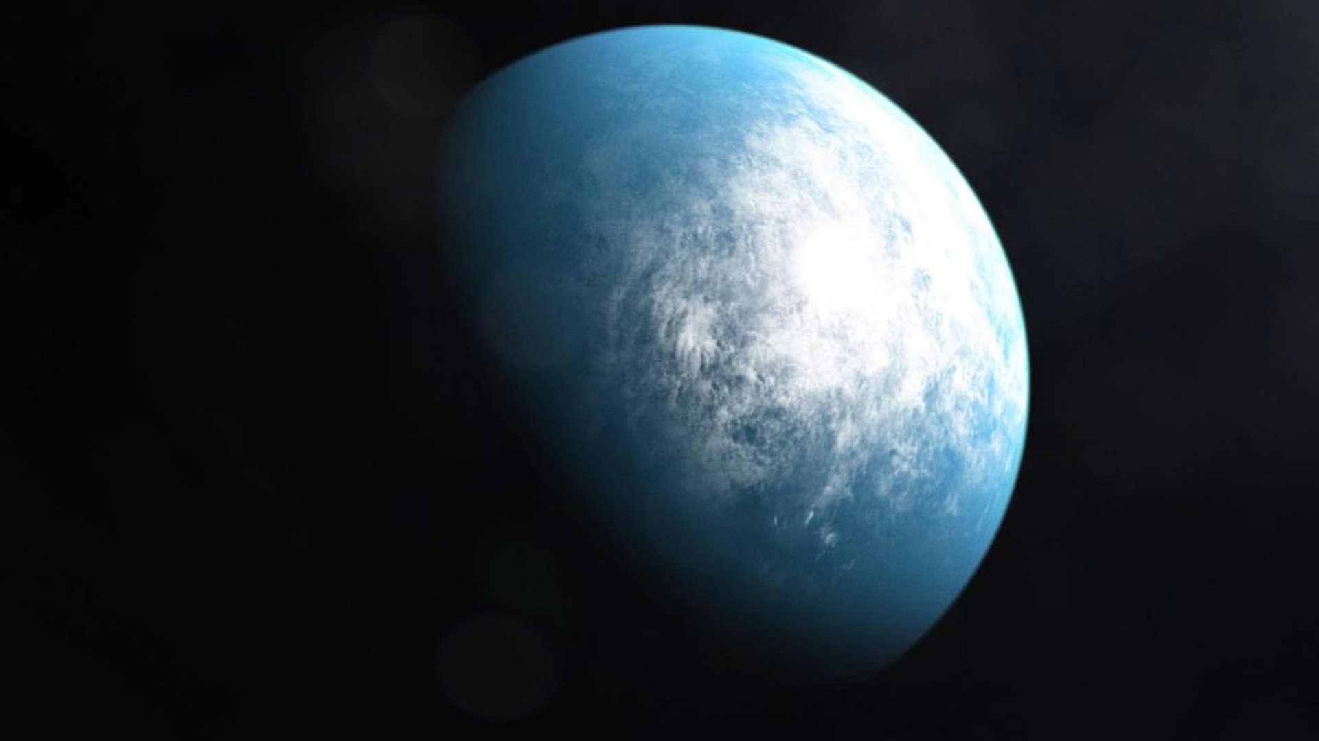 A close view of a big blue exoplanet on a black background.